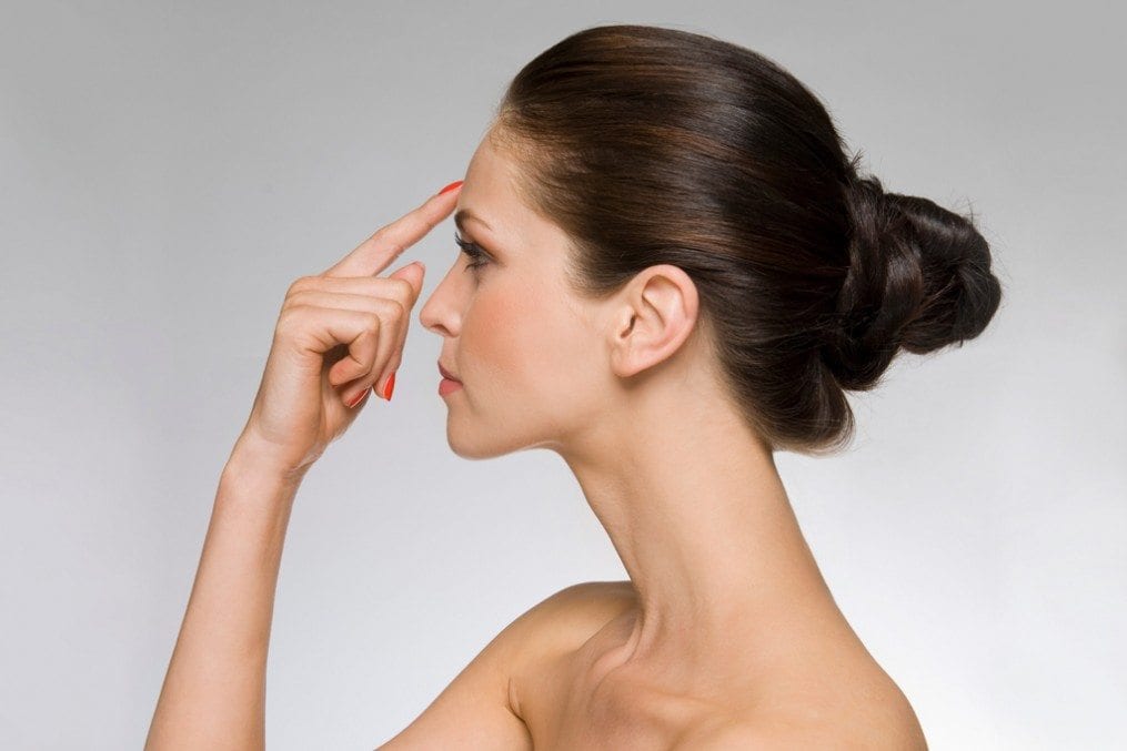 Woman with migraine